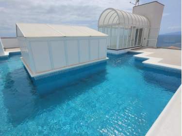Ferienwohnung mit Dachpool dicht am Meer in Playa La Arena